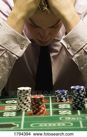 Man losing at roulette View Large Photo Image Picture - Man losing at roulette. Fotosearch