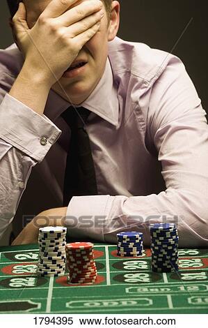 Man losing at roulette View Large Photo Image Stock Photography - Man losing at roulette. Fotosearch