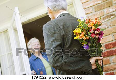 Man meeting a woman for a date View Large Photo Image Stock Image - Man meeting a woman for a date. Fotosearch