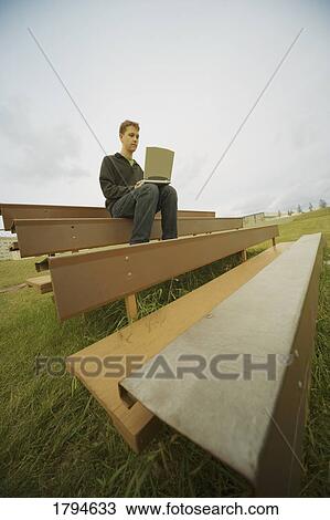 Man on laptop computer View Large Photo Image Stock Image - Man on laptop computer. Fotosearch
