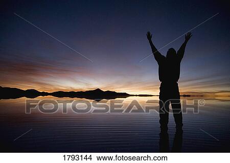 Picture - Man walking on water. Fotosearch