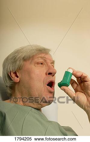 Man with an inhaler View Large Photo Image Stock Photography - Man with an inhaler. Fotosearch