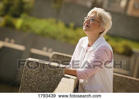Stock Photo - Middle-aged woman. Fotosearch