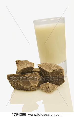 Stock Photograph - Milk and chocolate chunks. Fotosearch