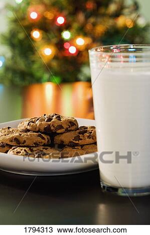 Stock Image - Milk and cookies for Santa. Fotosearch