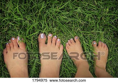 Mother and daughter with painted toenails View Large Photo Image Stock Photography - Mother and daughter with painted toenails. Fotosearch