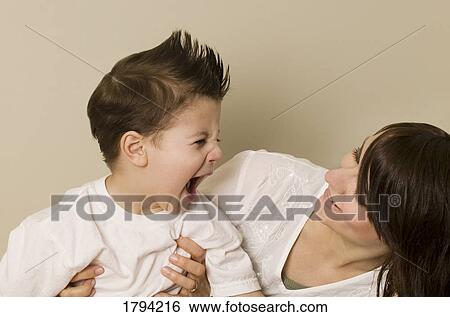 Mother with her screaming son View Large Photo Image Stock Photograph - Mother with her screaming son. Fotosearch