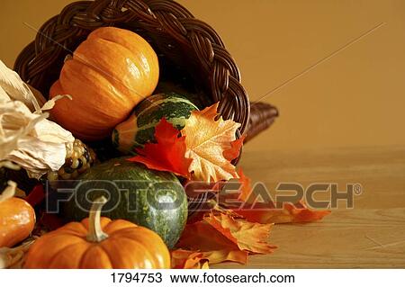 Stock Image - Overflowing cornucopia. Fotosearch