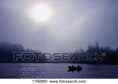 Stock Image - People fishing in evening. Fotosearch