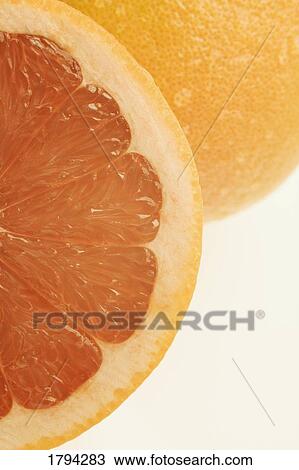 Pink grapefruits View Large Photo Image Stock Image - Pink grapefruits. Fotosearch
