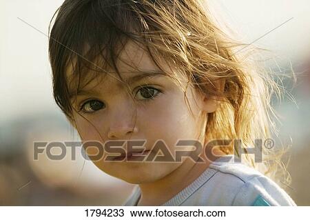 Stock Image - Portrait of a little girl. Fotosearch