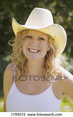 Portrait of a woman with a hat View Large Photo Image Stock Photography - Portrait of a woman with a hat. Fotosearch