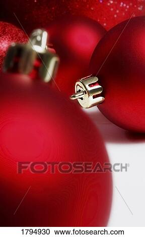 Stock Image - Red Christmas ornaments. Fotosearch