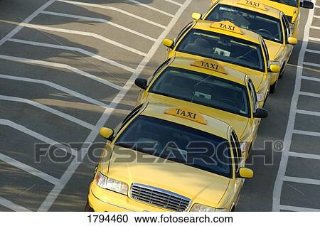 Stock Image - Row of taxi cabs. Fotosearch
