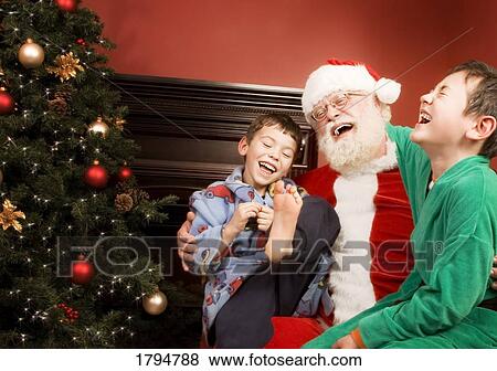 Santa laughing with children View Large Photo Image Stock Photo - Santa laughing with children. Fotosearch