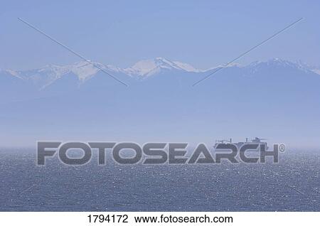 Ship in the distance View Large Photo Image Stock Image - Ship in the distance. Fotosearch