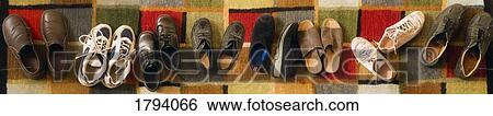 Stock Photograph - Shoes in a row. Fotosearch