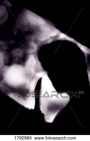 Stock Photography - Silhouette of man holding knife. Fotosearch