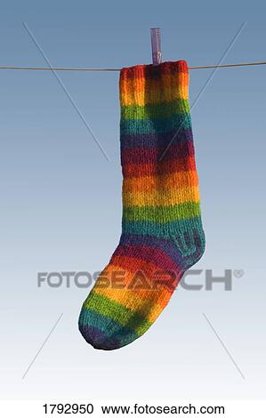Single striped sock hanging View Large Photo Image Stock Image - Single striped sock hanging. Fotosearch