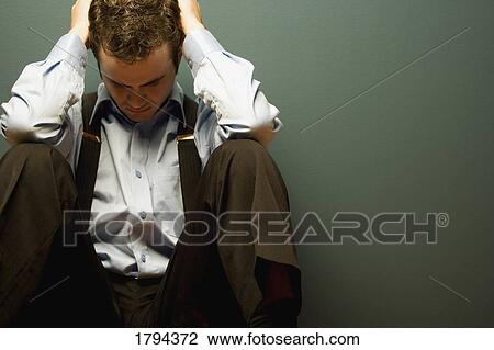 Stock Image - Stressed businessman. Fotosearch