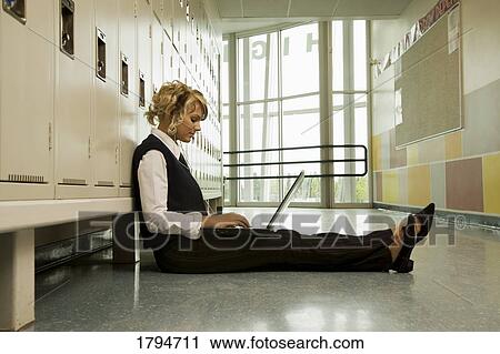 Student working on a laptop View Large Photo Image Stock Image - Student working on a laptop. Fotosearch