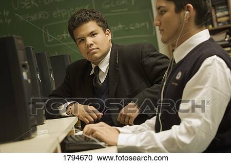 Stock Image - Students in a computer lab. Fotosearch