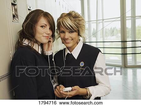 Students listening to music View Large Photo Image Stock Photograph - Students listening to music. Fotosearch