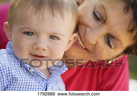 Toddler with grandma View Large Photo Image Stock Photo - Toddler with grandma. Fotosearch