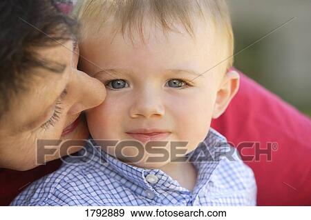 Toddler with grandma View Large Photo Image Stock Photo - Toddler with grandma. Fotosearch