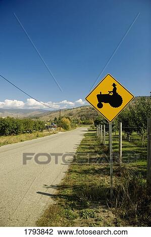 Tractor crossing sign View Large Photo Image Stock Image - Tractor crossing sign. Fotosearch