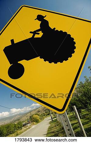 Tractor crossing sign View Large Photo Image Stock Image - Tractor crossing sign. Fotosearch