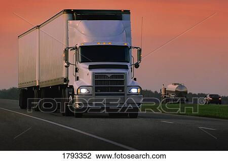 Stock Image - Truck hauling a load. Fotosearch