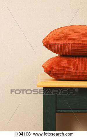 Two pillows on table View Large Photo Image Stock Photo - Two pillows on table. Fotosearch