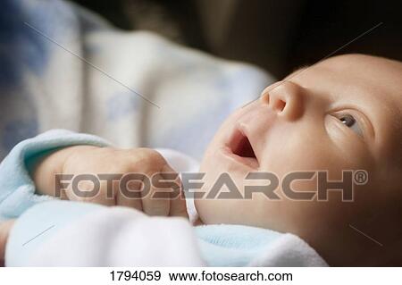 Watchful baby View Large Photo Image Stock Photo - Watchful baby. Fotosearch