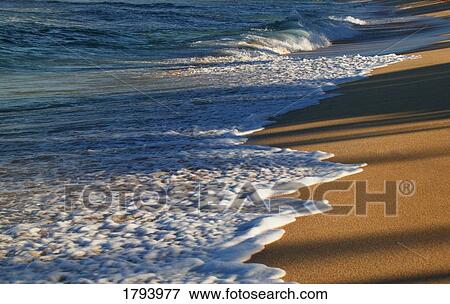 Waves on a beach View Large Photo Image Stock Photo - Waves on a beach. Fotosearch