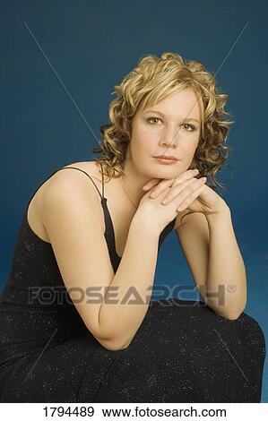 Woman posing View Large Photo Image Stock Photo - Woman posing. Fotosearch