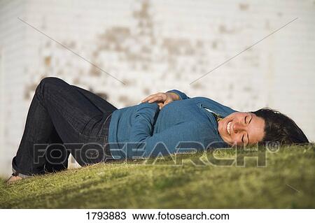 Stock Image - Woman relaxing. Fotosearch