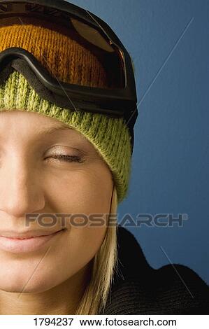 Woman wearing ski goggles View Large Photo Image Stock Photo - Woman wearing ski goggles. Fotosearch