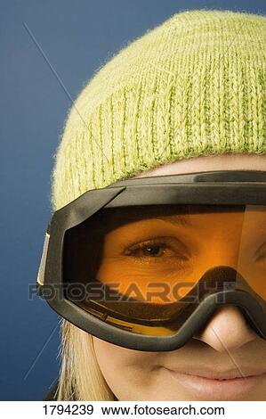 Woman wearing ski goggles View Large Photo Image Stock Photo - Woman wearing ski goggles. Fotosearch