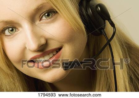 Woman with a head set View Large Photo Image Stock Image - Woman with a head set. Fotosearch