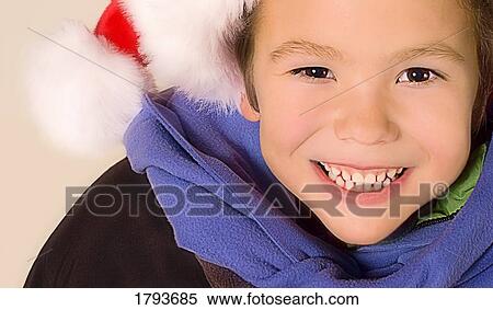 Stock Photography - Young child with Christmas outfit. Fotosearch