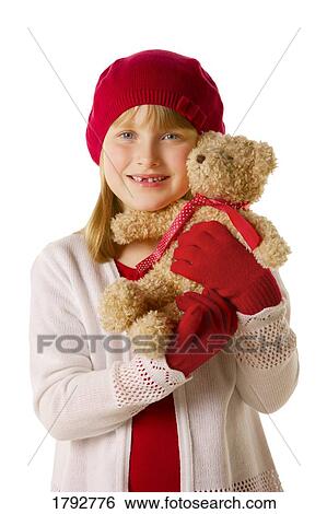 Stock Photograph - Young girl with bear. Fotosearch