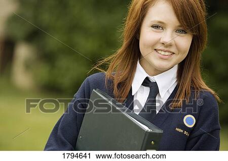Young girl with binder View Large Photo Image Stock Image - Young girl with binder. Fotosearch
