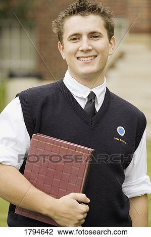 Stock Image - Young man at school. Fotosearch