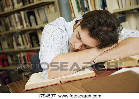 Young man sleeping View Large Photo Image Stock Photo - Young man sleeping. Fotosearch