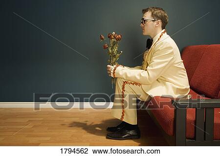 Young man waiting for a date View Large Photo Image Stock Image - Young man waiting for a date. Fotosearch