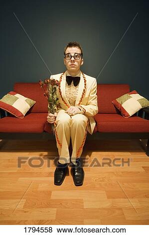 Young man waiting for a date View Large Photo Image Stock Photo - Young man waiting for a date. Fotosearch