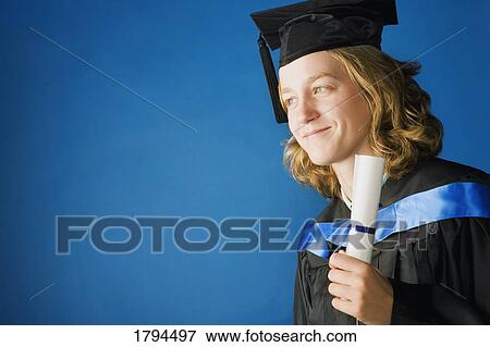 Stock Photo - Young woman graduating. Fotosearch