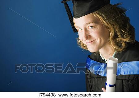 Young woman graduating View Large Photo Image Stock Photo - Young woman graduating. Fotosearch
