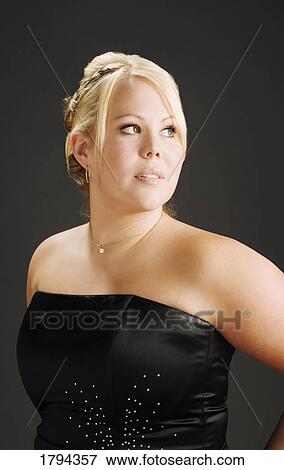 Stock Photo - Young woman posing. Fotosearch